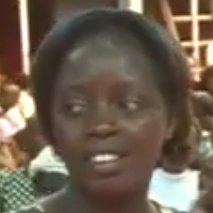Oridah Inyamunye, a joyful woman testifying about her miraculous healing from severe illness through prayer at Ebenezer TV ministry